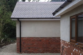 Triple garage built in garden in Adlington by KJB Builders