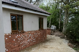 Triple garage built in garden in Adlington by KJB Builders