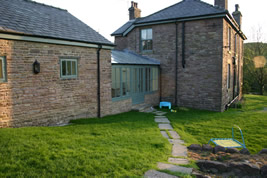 A barn conversion and renovation in Wild Boar Clough by KJB Builders