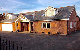 A conversion from a bungalow to a large detached house in Lymm