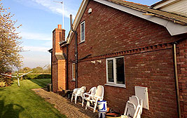 A conversion from a bungalow to a large detached house in Lymm