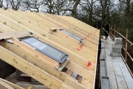 A timber roof structure in Adlington by KJB Builders