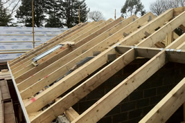 A timber roof structure in Adlington by KJB Builders